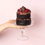 Double chocolate cake with chocolate ganache and raspberry filling.